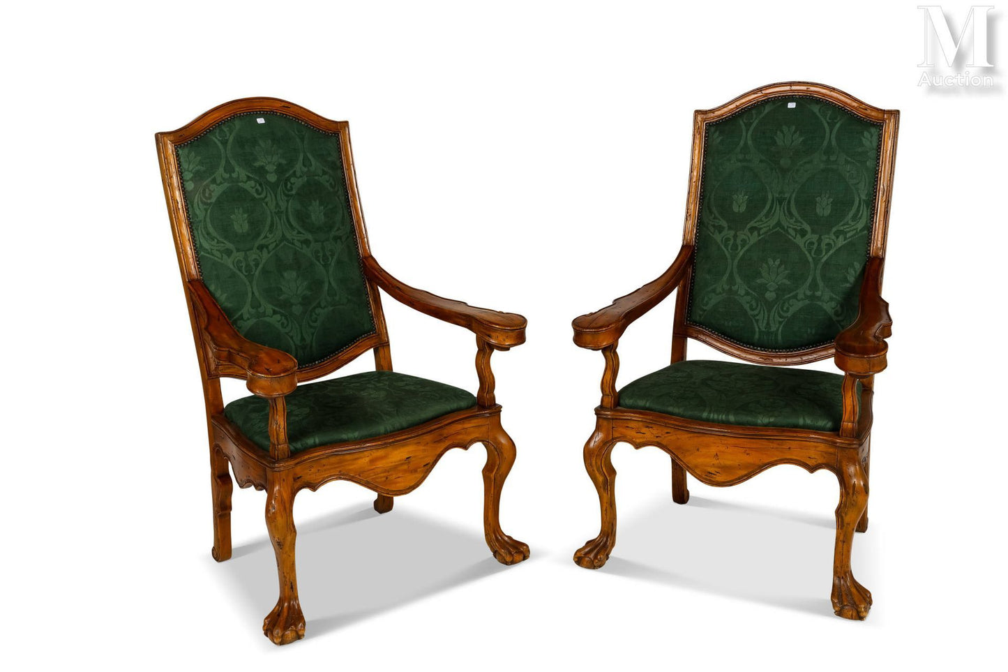 Pair of high back armchairs , scrolled arm brackets, claw feet resting on spheres 20C