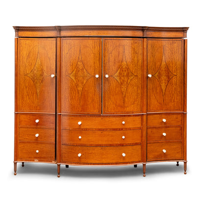 EDWARDIAN SATINWOOD INLAID AND CROSSBANDED SERPENTINE FRONTED WARDROBE