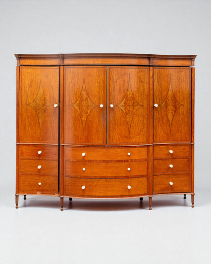 EDWARDIAN SATINWOOD INLAID AND CROSSBANDED SERPENTINE FRONTED WARDROBE