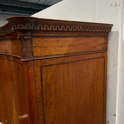 EDWARDIAN SATINWOOD INLAID AND CROSSBANDED SERPENTINE FRONTED WARDROBE