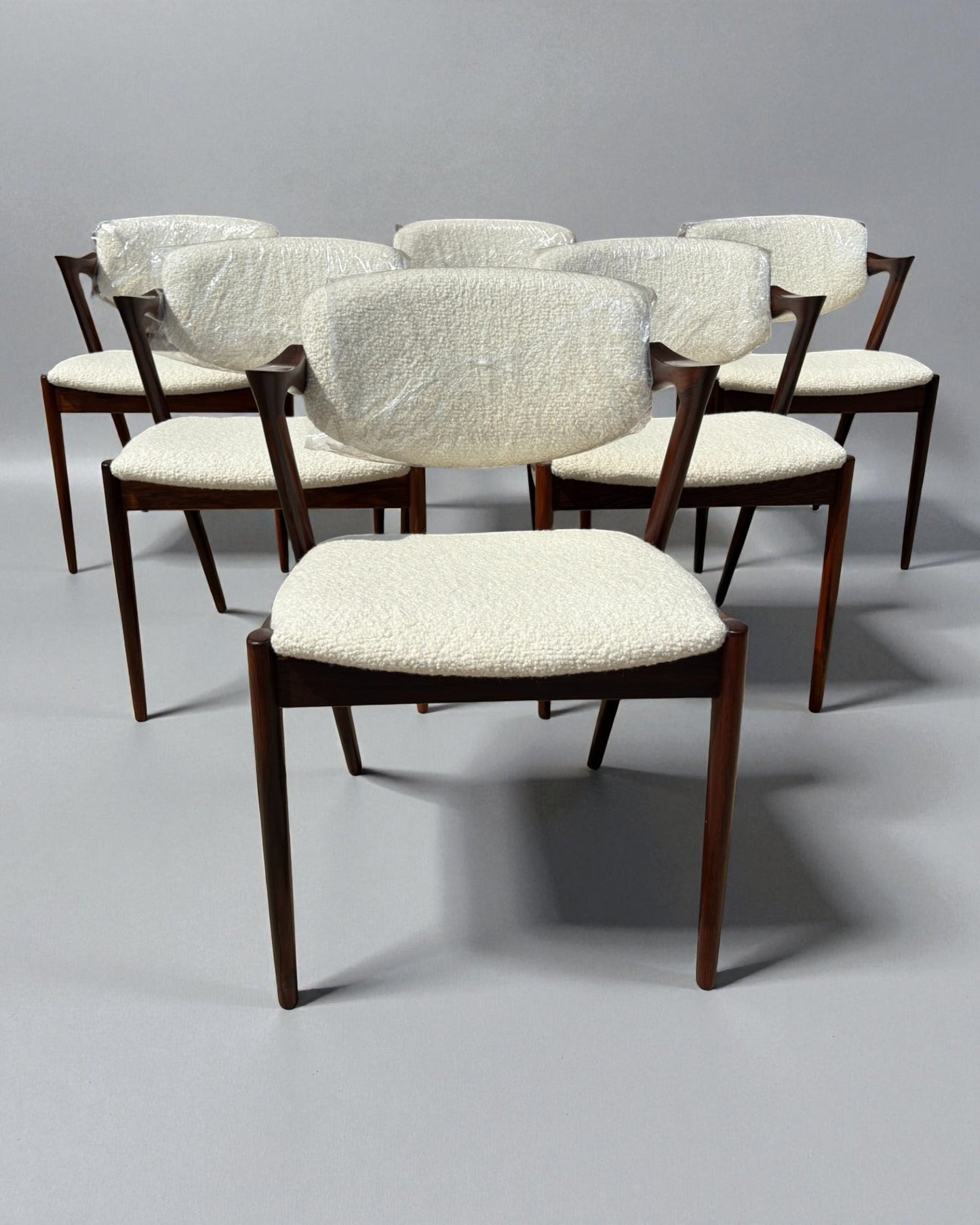 Kai Kristiansen Model 42 Chairs Reupholstered in Cashmere Boucle