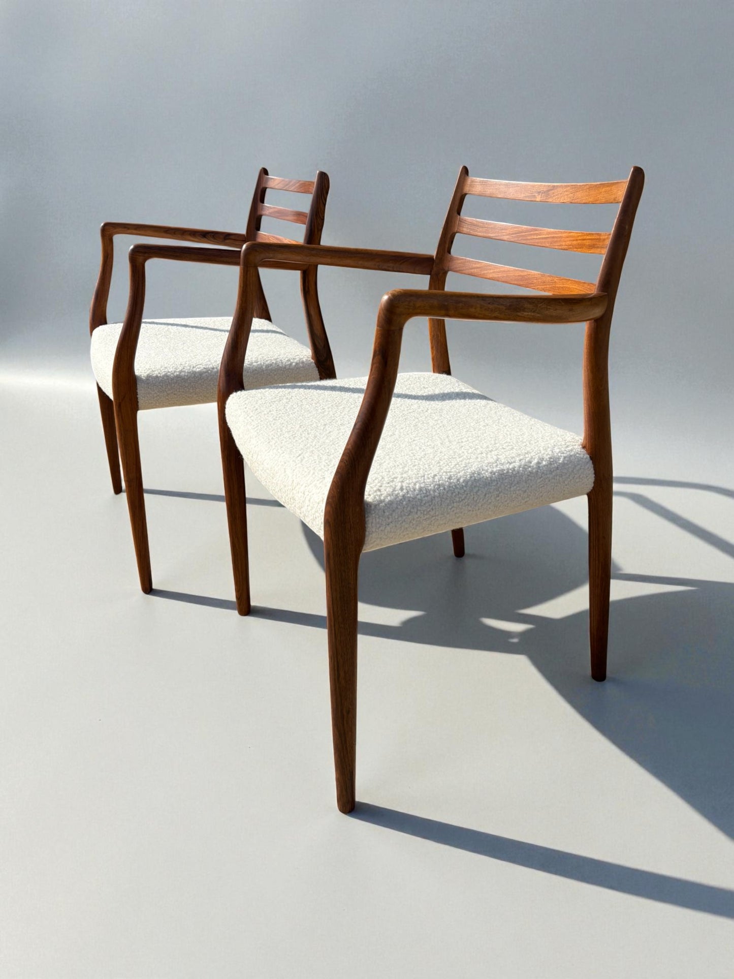 N O Moller Model 62 Dining Chair with Arms reupholstered in Cashmere Boucle