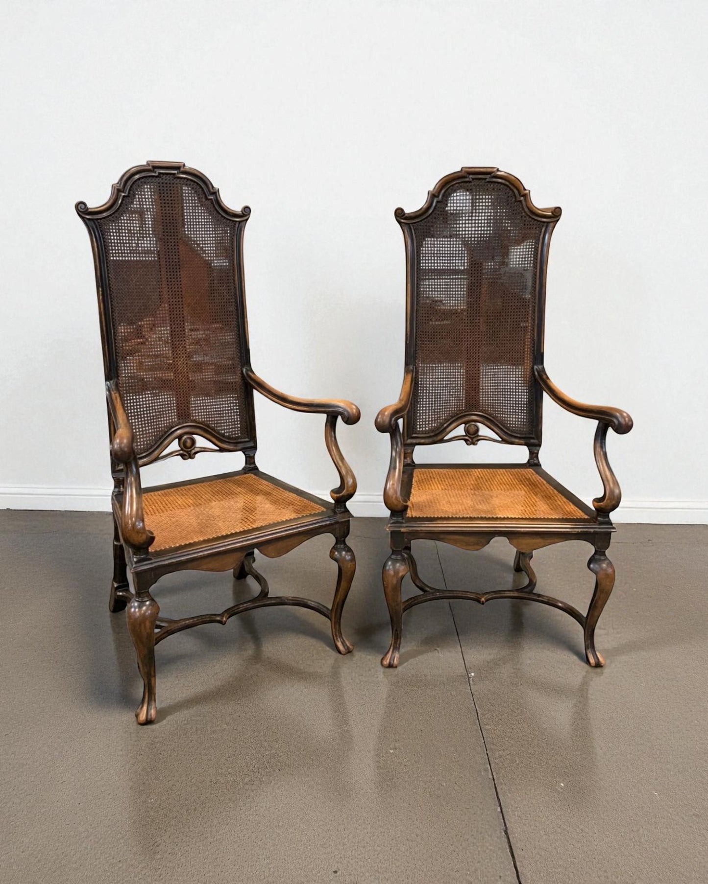 Pair of Chippendale armchairs with caned seat and back