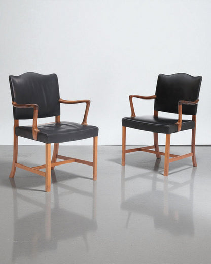 Pair of Rosewood Armchairs by Ole Wanscher Upholstered with Black Leather