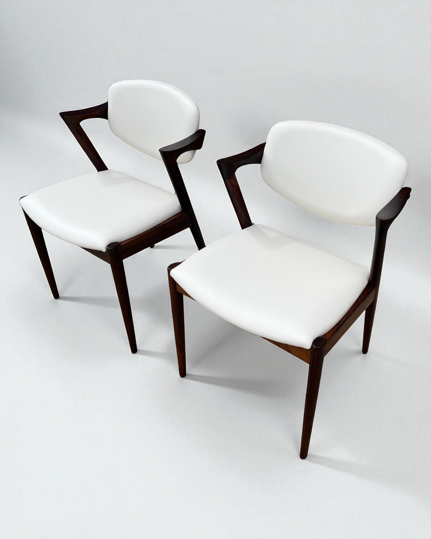 Kai Kristiansen Model 42 Chairs Re-upholstered in Cream Leather