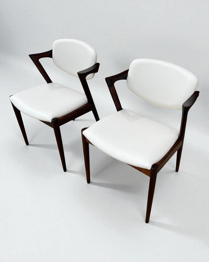 Kai Kristiansen Model 42 Chairs Re-upholstered in Cream Leather