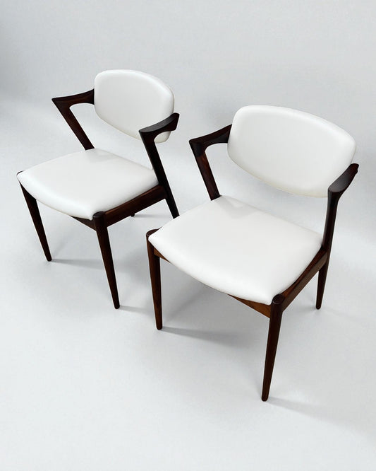 Kai Kristiansen Model 42 Chairs Re-upholstered in Cream Leather