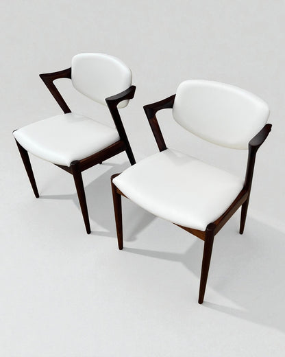 Kai Kristiansen Model 42 Chairs Re-upholstered in Cream Leather
