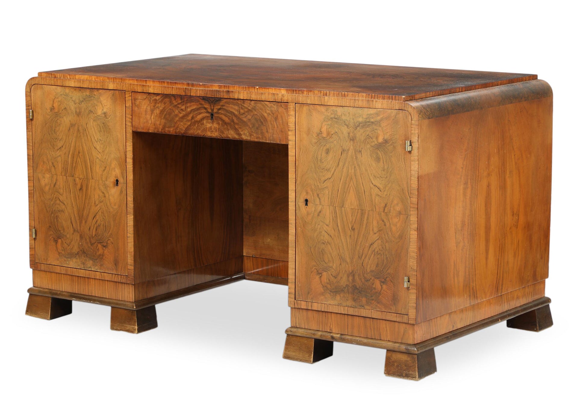 A freestanding nutwood Art Deco desk
