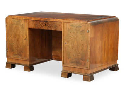 A freestanding nutwood Art Deco desk
