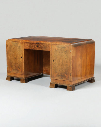 Danish cabinetmaker: A freestanding nutwood Art Deco desk: 1920–30s